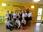 Instrumentinės muzikos festivalis Gražiškiuose. 4 klasės mokiniai su muzikos mokytoja R. Slabodiene