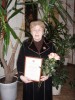 Marijampolės apskrities viršininko garbės ženklu apdovanuota Regina Naujokaitienėmokytoja muziejininkė už krašto etninės kultūros puoselėjimą, aktyvią muziejinę visuomeninę veiklą Lietuvos Nepriklausomybės atkūrimo 20-ųjų metinių proga